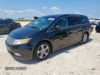 2011 Honda Odyssey Touring с VIN 5FNRL5H90BB033700, выставлен на аукционе Copart как лот 58602835 с пробегом 197 063 миль миль и Чистый • Clean title. История ставок и продаж доступна на DreamBid. Изображение 1.