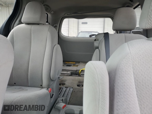 2012 Toyota Sienna with VIN 5TDKA3DC5CS013775, listed as a Copart auction lot 46312695 with 218,890 mi miles and Salvage Title. Bid and sale history available at DreamBid. Image 10.