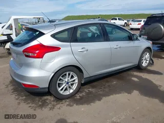 2016 Ford Focus SE with VIN 1FADP3K24GL254645, listed as a IAAI auction lot 41725276 with 117,645 mi miles. Bid and sale history available at carsss.com. Image 4.