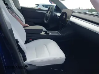 2025 Tesla Model Y Long Range z VIN 7SAYGDED0SF256650, wystawiony jako IAAI lot #41993206 z przebiegiem Nie podano mil oraz . Historia ofert i sprzedaży dostępna na DreamBid. Obrazek 5.
