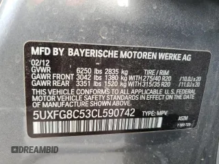 2012 BMW X6 50i z VIN 5UXFG8C53CL590742, wystawiony jako Copart lot #52072205 z przebiegiem 98 177 mil mil oraz Tytuł czysty. Historia ofert i sprzedaży dostępna na DreamBid. Obrazek 12.