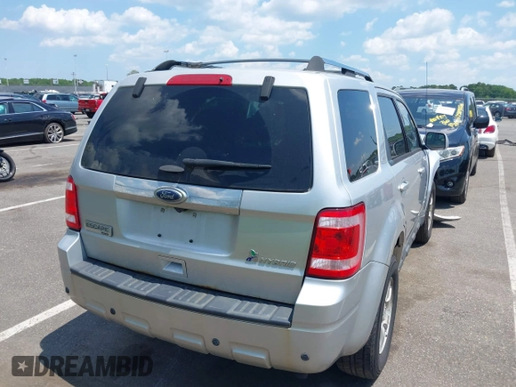 2011 Ford Escape Hybrid with VIN 1FMCU5K39BKB43196, listed as a IAAI auction lot 42558830 with 132,795 mi miles and . Bid and sale history available at DreamBid. Image 4.