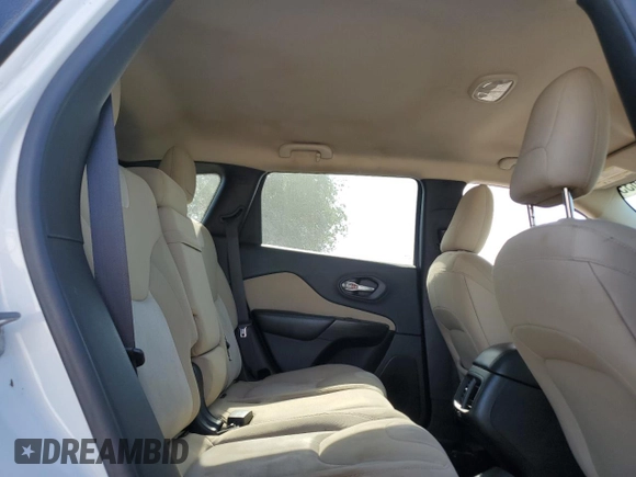 2016 Jeep Cherokee Altitude with VIN 1C4PJLAB2GW291427, listed as a Copart auction lot 52993635 with 129,912 mi miles and Salvage title. Bid and sale history available at DreamBid. Image 11.