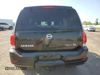2013 Nissan Armada SL z VIN 5N1BA0ND1DN605912, wystawiony jako Copart lot #53389245 z przebiegiem 165 715 mil mil oraz Szkoda całkowita • Salvage title. Historia ofert i sprzedaży dostępna na DreamBid. Obrazek 6.