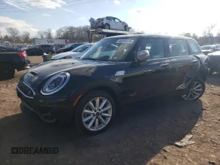 2024 MINI Clubman Cooper S with VIN WMWXJ1C03R2V23623, listed as a Copart auction lot 82334574 with 10,339 mi miles and Salvage Title. Bid and sale history available at carsss.com. Image 1.