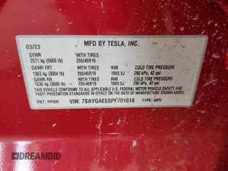 2023 Tesla Model Y Long Range z VIN 7SAYGAEE8PF701618, wystawiony jako Copart lot #57573875 z przebiegiem 39 463 mil mil oraz Szkoda całkowita • Salvage title. Historia ofert i sprzedaży dostępna na DreamBid. Obrazek 13.