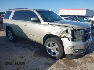 2016 Chevrolet Tahoe LT z VIN 1GNSCBKC9GR314133, wystawiony jako IAAI lot #41959472 z przebiegiem 149 162 mil mil oraz . Historia ofert i sprzedaży dostępna na DreamBid. Obrazek 1.