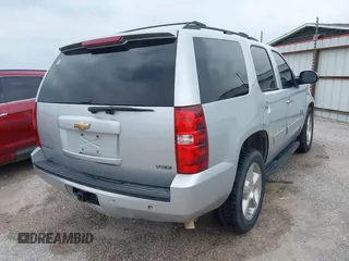 2011 Chevrolet Tahoe LT with VIN 1GNSCBE05BR190310, listed as a IAAI auction lot 42243623 with 249,453 mi miles and . Bid and sale history available at DreamBid. Image 4.