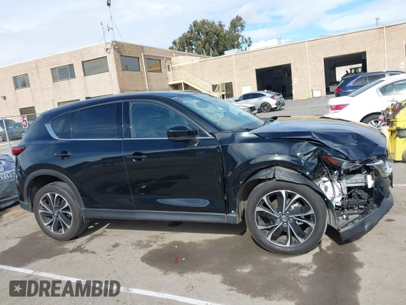 2023 Mazda CX-5 2.5 S Premium Package with VIN JM3KFBDM4P0266378, listed as a IAAI auction lot 41655712 with 31,746 mi miles. Bid and sale history available at carsss.com. Image 13.