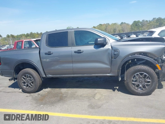 2024 Ford Ranger XLT with VIN 1FTER4GHXRLE46487, listed as a IAAI auction lot 41899384 with 5,570 mi miles. Bid and sale history available at carsss.com. Image 13.