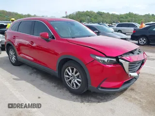 2016 Mazda CX-9 Touring z VIN JM3TCACY4G0112961, wystawiony jako IAAI lot #42094718 z przebiegiem 114 679 mil mil oraz . Historia ofert i sprzedaży dostępna na DreamBid. Obrazek 1.