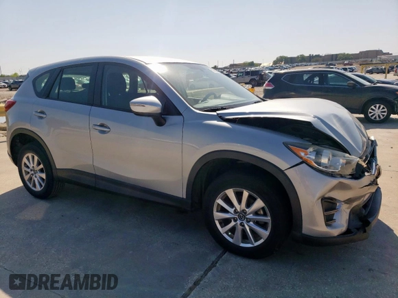 2016 Mazda CX-5 Sport with VIN JM3KE2BY6G0671358, listed as a Copart auction lot 51990095 with 117,763 mi miles and Salvage Title. Bid and sale history available at carsss.com. Image 4.