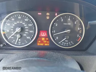 2007 BMW X5 3.0si with VIN 5UXFE43557L011254, listed as a IAAI auction lot 41696843 with 201,402 mi miles. Bid and sale history available at carsss.com. Image 7.
