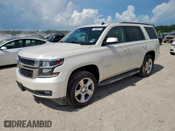 2015 Chevrolet Tahoe LT with VIN 1GNSCBKC5FR302611, listed as a Copart auction lot 62068165 with 184,136 mi miles and Salvage title. Bid and sale history available at DreamBid. Image 1.