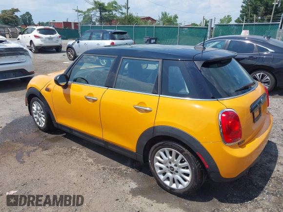 2016 MINI Hardtop 4 Door z VIN WMWXU1C53G2D08424, wystawiony jako IAAI lot #42509304 z przebiegiem 97 729 mil mil oraz . Historia ofert i sprzedaży dostępna na DreamBid. Obrazek 3.