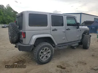 2018 Jeep Wrangler Unlimited Rubicon Recon z VIN 1C4HJWFGXJL840598, wystawiony jako Copart lot #59399595 z przebiegiem 63 298 mil mil oraz Szkoda całkowita • Salvage title. Historia ofert i sprzedaży dostępna na DreamBid. Obrazek 3.