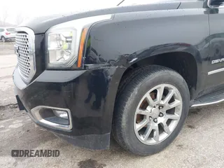 2017 GMC Yukon XL Denali with VIN 1GKS2HKJ2HR310377, listed as a IAAI auction lot 41153582 with 130,194 mi miles. Bid and sale history available at carsss.com. Image 22.