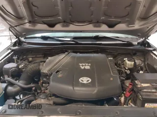 2013 Toyota Tacoma with VIN 5TFUU4EN0DX071116, listed as a IAAI auction lot 41647546 with 243,898 mi miles and . Bid and sale history available at DreamBid. Image 10.