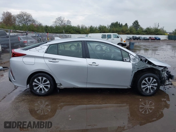 2021 Toyota Prius LE with VIN JTDKAMFP9M3170928, listed as a IAAI auction lot 42123934 with 58,293 mi miles and . Bid and sale history available at DreamBid. Image 14.