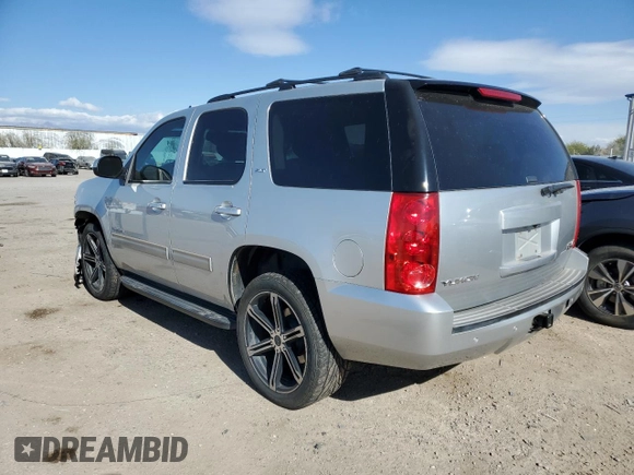 2014 GMC Yukon SLT with VIN 1GKS1CE00ER229897, listed as a Copart auction lot 88153085 with 213,106 mi miles and Salvage Title. Bid and sale history available at carsss.com. Image 2.