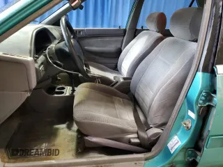 1995 Ford Escort z VIN 3FASP13J7SR205967, wystawiony jako Copart lot #73087444 z przebiegiem 100 401 mil mil oraz Szkoda całkowita • Salvage title. Historia ofert i sprzedaży dostępna na DreamBid. Obrazek 7.