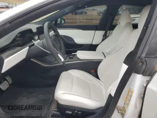 2022 Tesla Model S Plaid with VIN 5YJSA1E69NF461067, listed as a Copart auction lot 50060685 with 46,785 mi miles and Salvage Title. Bid and sale history available at DreamBid. Image 7.