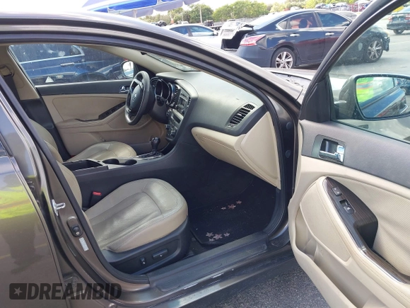 2011 Kia Optima EX with VIN KNAGN4A74B5164311, listed as a IAAI auction lot 41558907 with Not Provided miles and . Bid and sale history available at carsss.com. Image 5.
