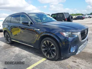 2024 Mazda CX-90 S with VIN JM3KK1HC6R1133173, listed as a IAAI auction lot 42617283 with 28,664 mi miles and . Bid and sale history available at DreamBid. Image 1.