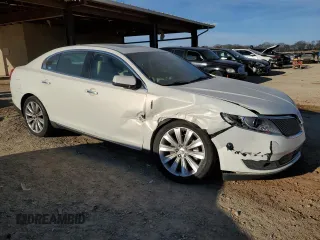 2013 Lincoln MKS EcoBoost with VIN 1LNHL9FTXDG604941, listed as a Copart auction lot 47445485 with 66,591 mi miles and Salvage title. Bid and sale history available at DreamBid. Image 4.