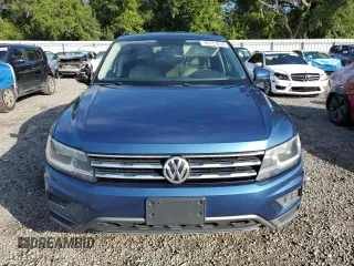 2020 Volkswagen Tiguan S with VIN 3VV1B7AX3LM052051, listed as a Copart auction lot 65157235 with 216,292 mi miles and Clean title. Bid and sale history available at DreamBid. Image 5.