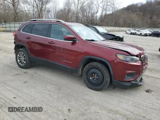 2019 Jeep Cherokee Latitude Plus with VIN 1C4PJMLX2KD422696, listed as a Copart auction lot 50888725 with 72,737 mi miles and Salvage Title. Bid and sale history available at DreamBid. Image 4.