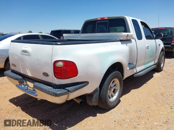 2001 Ford F-150 XL z VIN 2FTZX07221CA22859, wystawiony jako IAAI lot #42375196 z przebiegiem Nie podano mil oraz . Historia ofert i sprzedaży dostępna na DreamBid. Obrazek 4.
