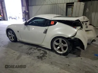 2012 Nissan 370Z z VIN JN1AZ4EH3CM565276, wystawiony jako Copart lot #56654845 z przebiegiem 77 788 mil mil oraz Nie do naprawy. Historia ofert i sprzedaży dostępna na DreamBid. Obrazek 2.