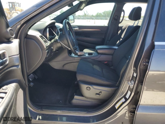2018 Jeep Grand Cherokee Laredo E with VIN 1C4RJFAG9JC444089, listed as a Copart auction lot 49710925 with 127,707 mi miles and Salvage Title. Bid and sale history available at carsss.com. Image 7.