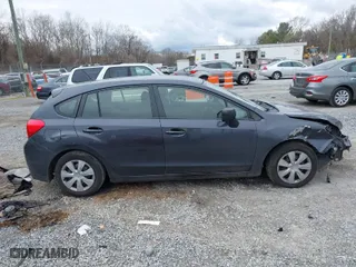 2014 Subaru Impreza Wagon 2.0i with VIN JF1GPAA60E8307721, listed as a IAAI auction lot 40900681 with 194,144 mi miles. Bid and sale history available at carsss.com. Image 14.