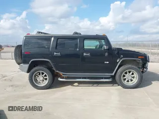 2006 Hummer H2 with VIN 5GRGN23U66H120601, listed as a IAAI auction lot 41524634 with 155,003 mi miles. Bid and sale history available at carsss.com. Image 13.