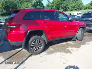 2021 Jeep Grand Cherokee Trailhawk with VIN 1C4RJFLG8MC549403, listed as a IAAI auction lot 42538177 with 33,124 mi miles and . Bid and sale history available at DreamBid. Image 4.