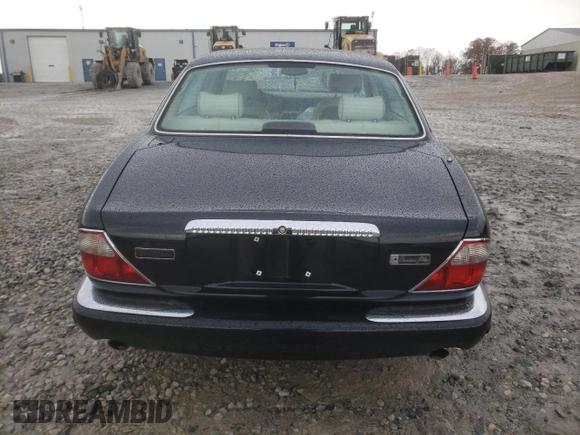 2003 Jaguar XJ Vanden Plas with VIN SAJDA24C33LF52131, listed as a Copart auction lot 84263554 with Not provided miles and Clean title. Bid and sale history available at DreamBid. Image 6.