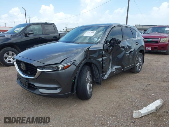 2021 Mazda CX-5 Grand Touring with VIN JM3KFBDM2M0431484, listed as a IAAI auction lot 42547665 with 34,757 mi miles and . Bid and sale history available at DreamBid. Image 18.