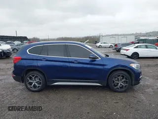 2019 BMW X1 sDrive28i with VIN WBXHU7C5XK5L10933, listed as a IAAI auction lot 41931162 with 55,308 mi miles. Bid and sale history available at carsss.com. Image 13.