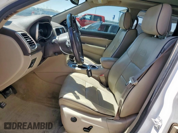 2017 Jeep Grand Cherokee Overland z VIN 1C4RJFCT5HC612721, wystawiony jako Copart lot #57652865 z przebiegiem 103 690 mil mil oraz Tytuł czysty. Historia ofert i sprzedaży dostępna na DreamBid. Obrazek 7.