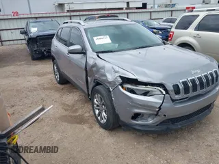 2019 Jeep Cherokee Latitude Plus with VIN 1C4PJLLB5KD128613, listed as a IAAI auction lot 42086514 with 131,557 mi miles. Bid and sale history available at carsss.com. Image 1.