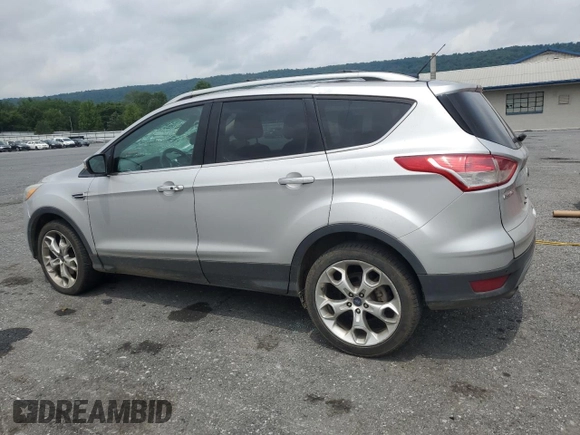 2013 Ford Escape Titanium with VIN 1FMCU9J9XDUB88989, listed as a Copart auction lot 64994445 with 192,833 mi miles and Salvage title. Bid and sale history available at DreamBid. Image 2.