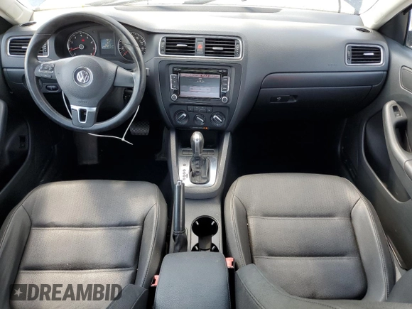 2012 Volkswagen Jetta SE with VIN 3VWDP7AJ7CM062149, listed as a Copart auction lot 62779485 with 154,771 mi miles and Salvage title. Bid and sale history available at DreamBid. Image 8.