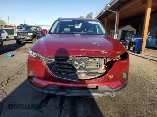 2022 Mazda CX-9 Touring Plus z VIN JM3TCBAY2N0628189, wystawiony jako Copart lot #55663825 z przebiegiem 56 511 mil mil oraz Szkoda całkowita • Salvage title. Historia ofert i sprzedaży dostępna na DreamBid. Obrazek 5.