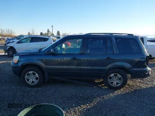 2003 Honda Pilot EX with VIN 2HKYF18433H614451, listed as a IAAI auction lot 41561972 with 199,394 mi miles. Bid and sale history available at carsss.com. Image 15.