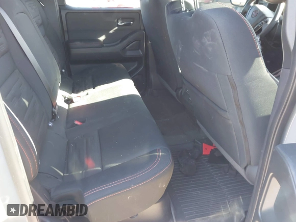 2023 Nissan Frontier Pro-4X with VIN 1N6ED1EK7PN670665, listed as a IAAI auction lot 41785130 with 21,561 mi miles and . Bid and sale history available at DreamBid. Image 8.