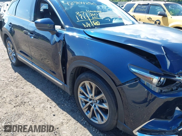 2019 Mazda CX-9 Grand Touring with VIN JM3TCBDY6K0335886, listed as a IAAI auction lot 42704250 with 37,171 mi miles and . Bid and sale history available at DreamBid. Image 17.
