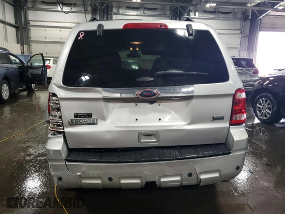 2012 Ford Escape Limited z VIN 1FMCU9EG1CKB16341, wystawiony jako Copart lot #57063845 z przebiegiem 128 205 mil mil oraz Szkoda całkowita • Salvage title. Historia ofert i sprzedaży dostępna na DreamBid. Obrazek 6.