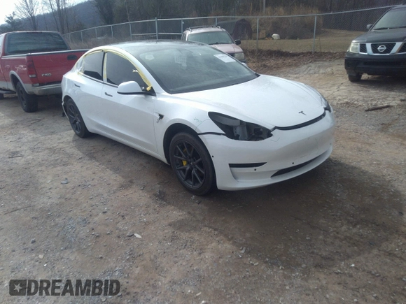 2020 Tesla Model 3 Standard Range Plus with VIN 5YJ3E1EA0LF597839, listed as a IAAI auction lot 41639219 with 49,220 mi miles. Bid and sale history available at carsss.com. Image 1.